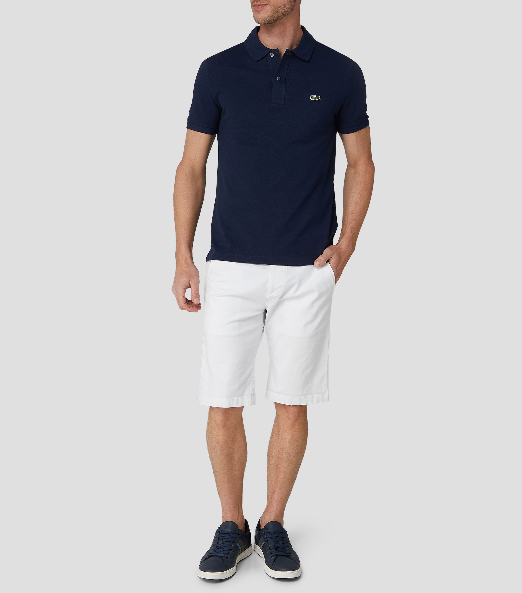 Playera tipo polo con manga corta lisa Hombre